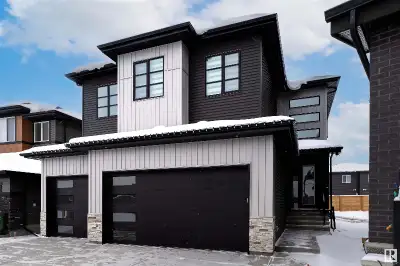 This beautifully designed home offers over 3,900 SF of finished living space! One of the garage stal...