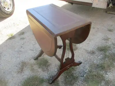 Selling quickly at $100.00 ...its 11 inches deep x 19 1/2 inches across x 22 inches tall in size.......