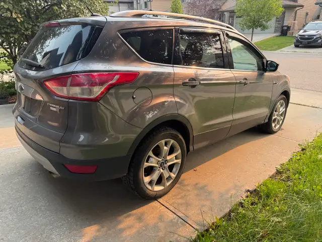 2014 Ford Escape Titanium **Rear left damage**526224465950167042