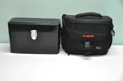 Offered for sale are these two high quality camera equipment bags with the Canon brand name. One Can...