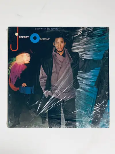 For sale is aJeffrey Osborne vinyl record, titled 'Stay With Me Tonight.' This record has been well-...