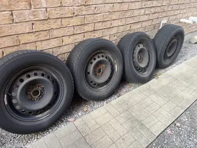 Set of 4 Michelin Latitude X-Ice winter tires on steel rims. Size: 235/65R17 Bolt Pattern: 5x120 (Fi...