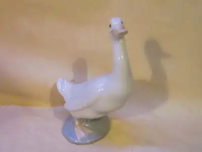 This figurine is in good used condition with no damage. It measures 5&3/4 inches tall, 4&1/4 inches...