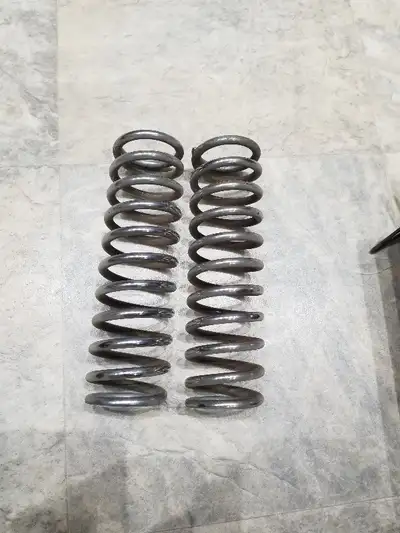 Suspension springs: Could be used for a go-cart or a motorcycle (8.5 inches long, 2.5 inches across)