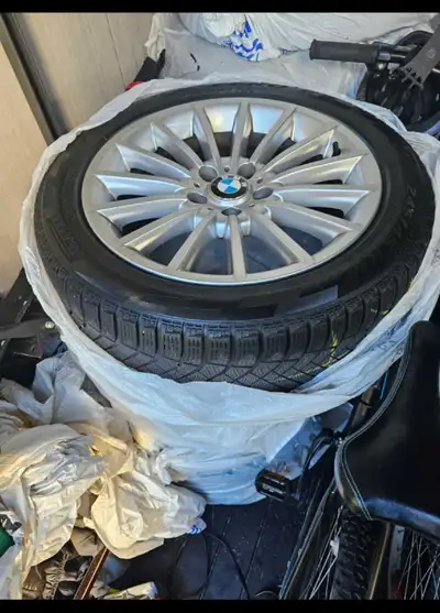 Used set of BMW 18" wheels with Pirelli Winter tires 7mm thread 245/45/R18 5x120 bolt pattern was fi...