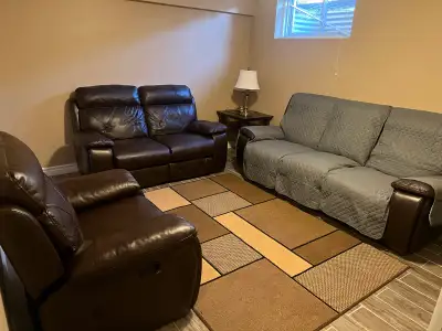 Dark brown leather recliner couch and love & chair seat. Used In, View more