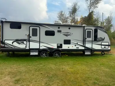 2019 Jayco White Hawk 29BH, a travel trailer that blends family-friendly comfort with upscale style....