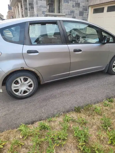 Automatic, working AC, grey exterior with matching interior, AUX, battery is a year old Good tires,...