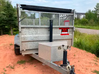 K-Trail Dump Tandum Trailer 10 x 6 Galvanized Steel in excellent condition.It has a screen wind up c...