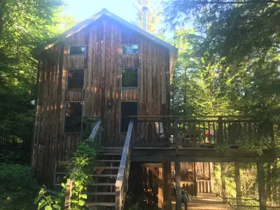 Timber frame cottage on lake, View more