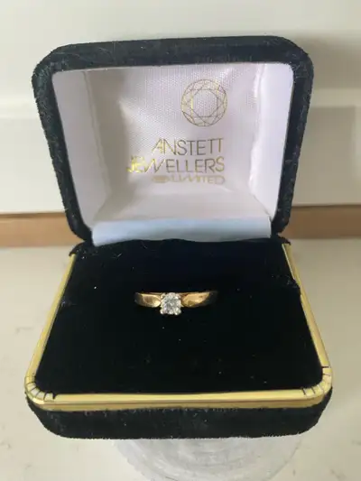 Beautiful engagement ring with original Anstett ring box from 1999. Approximately size 7. It is 14k...