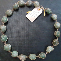 Unusual jade/nephrite necklace green, 13 inch strand, marked