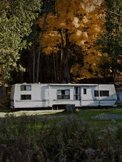 Older 30 foot trailer. Looking for someone to take to take away to scrap. It has a hole in the roof...