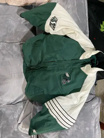 Snuggle up in this vintage Starter Roughriders jacket, perfect for showing off your team spirit! Thi...