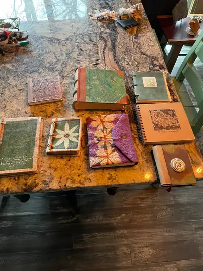 Ten rustic bound journals art books, View more