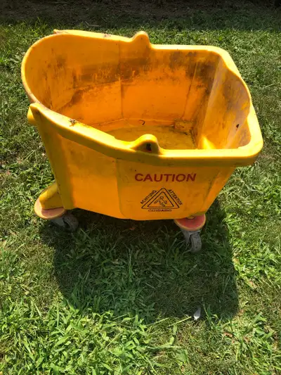 $55 for commercial mop bucket, missing handle and wringer, View more
