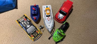 5 TOY VEHICLES BOAT SNOWMOBILE RACE CARS NEW BATTERIES NEEDED