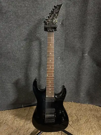 Need a 7 string but short on cash?! This guitar is for you. In the late 90’s, Axe Music brought a sh...