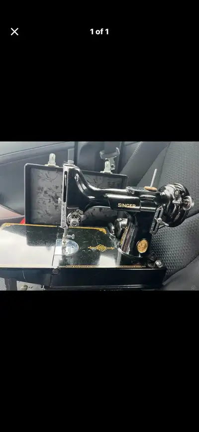Singer Sewing Machine, View more