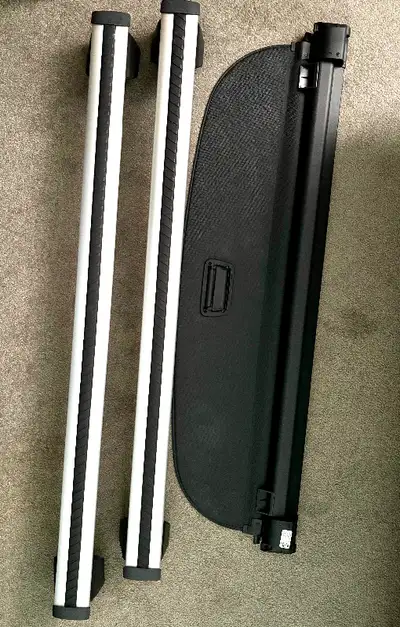 Roof rack, and privacy cover for trunk. Good condition, OEM parts.
