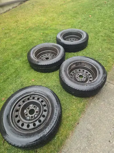 BF Goodrich Winter Slalom tires on steel rims. 225 65 17 Bolt pattern: 5x127mm or 5x5" Will fit Dodg...