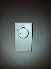 Electric heater thermostat