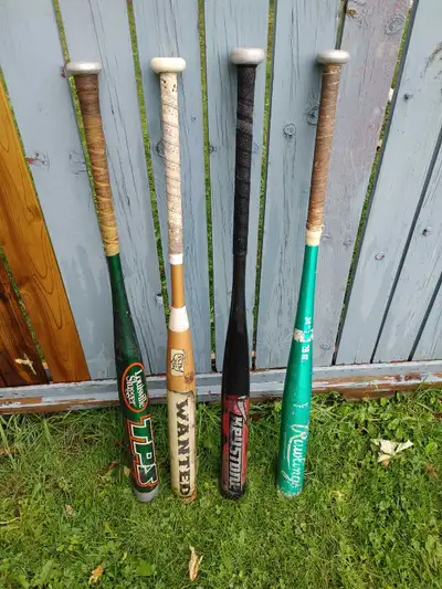 Assorted softball bats, View more