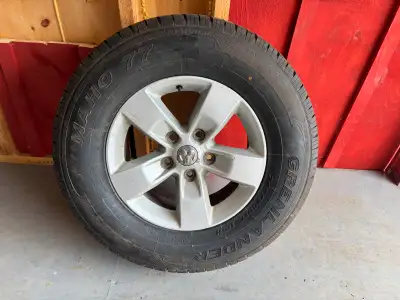 Selling a Tire and Rim for Dodge Ram. The tire size is 265/70R17. Asking $150.00. Open to offers
