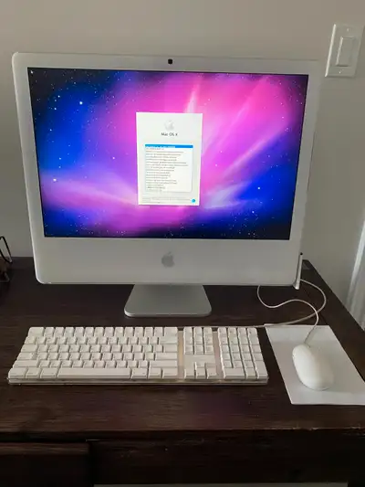 This 2006 iMac "Core 2 Duo" 24-Inch is a reliable and capable desktop for basic tasks or retro enthu...