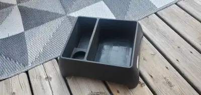 Keep your car trunk tidy with this black plastic jug tub trunk carrier, perfect for holding oil, win...