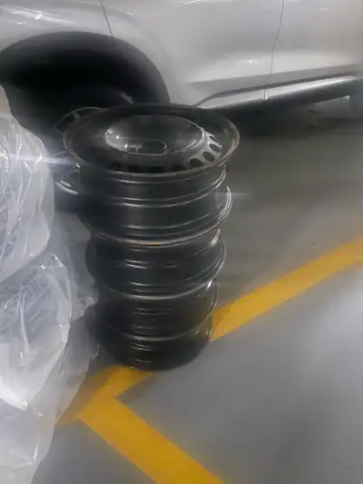 Four 17 inch steel rims original equipment from a Hyundia Tucson. Also has the original factory whee...