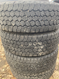 four Goodyear Wrangler Kevlar 245/70R17 tires