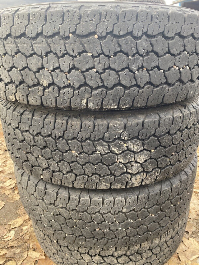 four Goodyear Wrangler Kevlar 245/70R17 tires in Tires & Rims in Penticton
