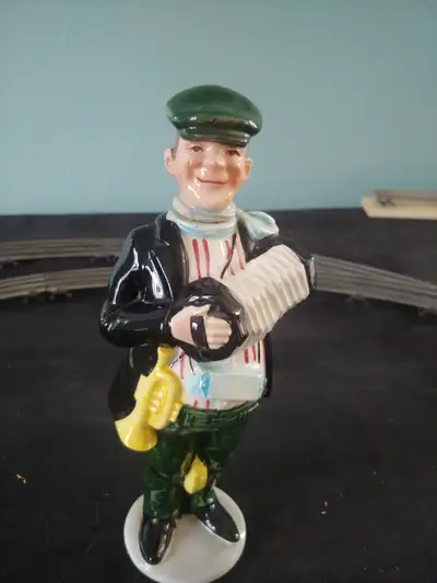 Vintage ceramic flask old man playing accordion