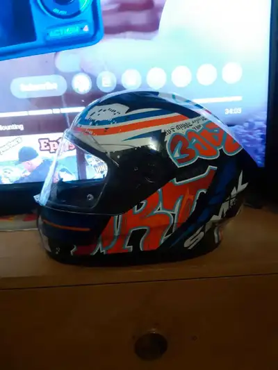 This is an SMK motorcycle helmet in size XL, offering both style and safety on the road. While it's...