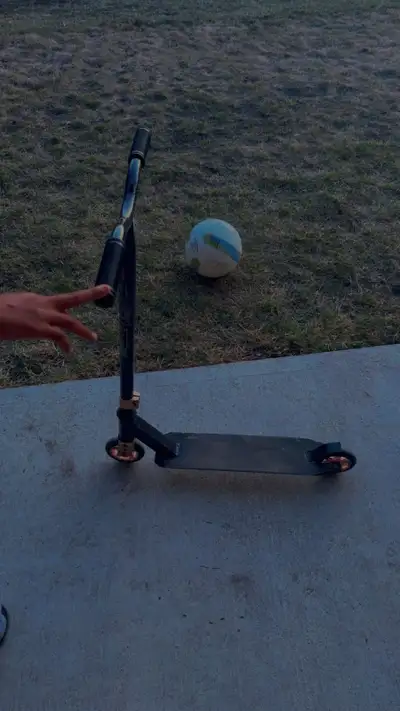 Black stunt scooter with gold accents. Good condition. Great for tricks and transportation. Durable...