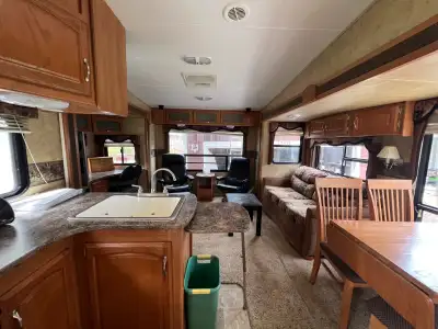5th Wheel Camper Unit with 3 slides. It's like a beautiful cabin with nice bright bathroom. Lowered...