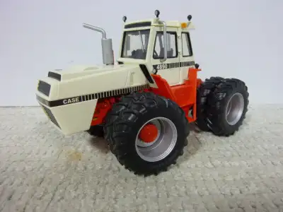 1/32nd CASE 4890 Farm Toy Tractor produced by ERTL in 2014. This is #2 in the Evolution 4wd series p...