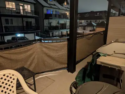 Fits a standard apartment balcony all the way around. Brown/beige colour. 100% privacy