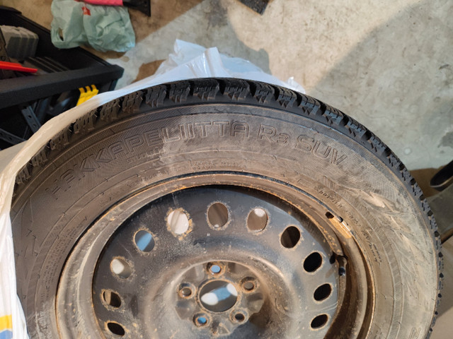 Nokian Hakkapeliitta R3 winter tires on rims with rim covers in Tires & Rims in Calgary