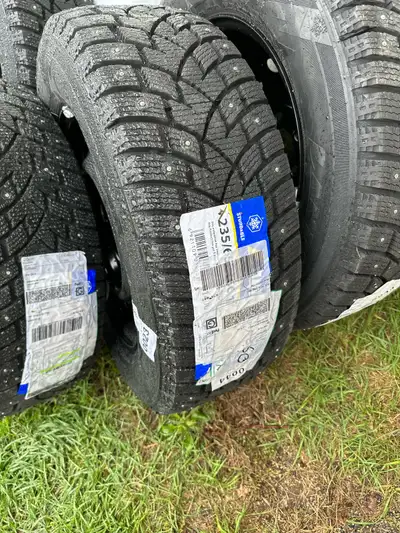 Set of four Landsail ICE STAR IS37 (STUDDED) tires LT235/65R16 - 121/119R (10 ply) mounted on DTD Hu...
