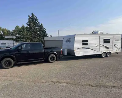 Road Ranger Camper Trailer - Half ton towable. Year: 2004 Length: 25' Condition: good Sleeps: 6 Exte...