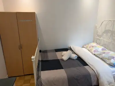 Room for rent. Kitchen and bathroom shared with other guests.