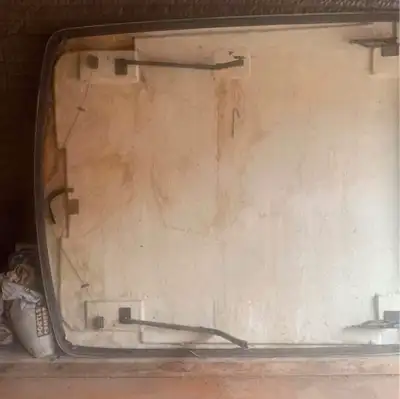 7’ x 6’3”beige truck cap. Bottom view. Top is clean and smooth beige fibreglass $25