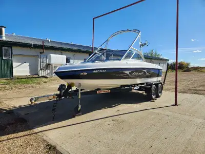 350 hours, stored in indoor heated storage. 2nd owners. Serviced annually. Spare prop. Comes with ev...