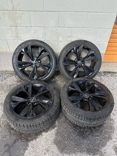 Selling a Set of 18” Audi Rims on Winter Tires. Tires have great tread left. Fits Audi models such a...