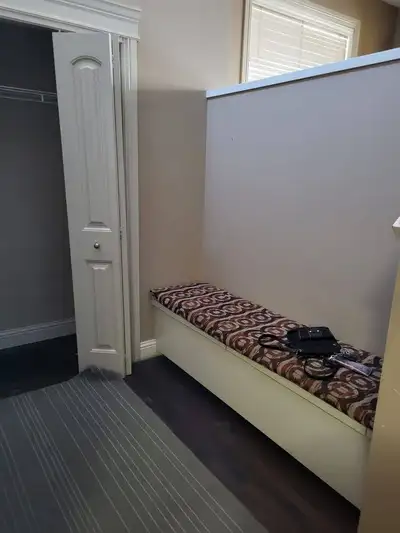 A duplex with two full and 1 half bathrooms and 3 bedrooms and 1 bonus room with shared kitchen (wit...