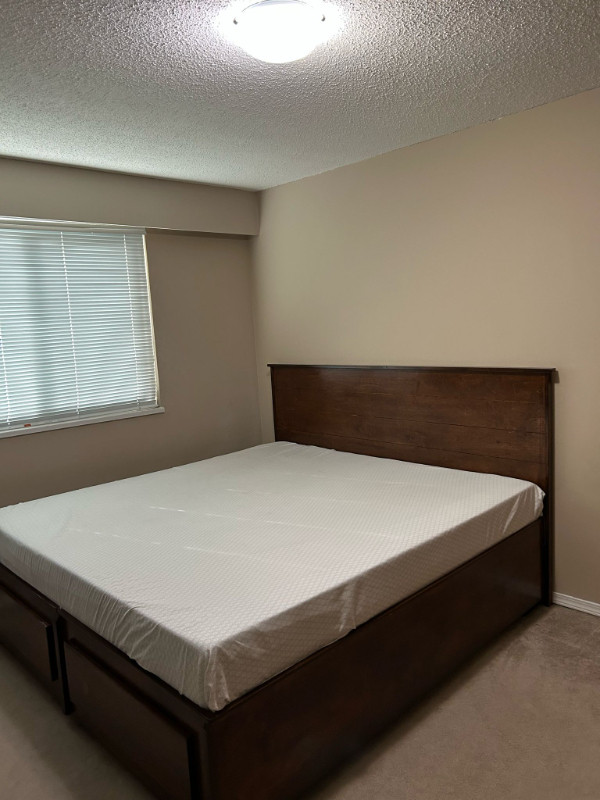 King size mattress and bed frame with storage capacity in Beds & Mattresses in Burnaby/New Westminster