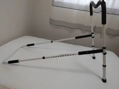 Safety bed rail for seniors or anyone needing assistance. Support slides under mattress. Rubber on h...