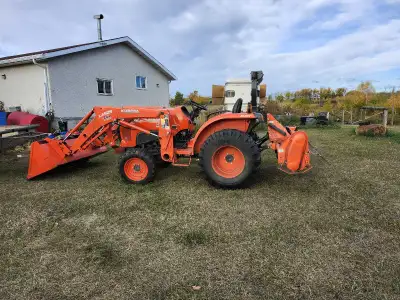 2017 Kabota 4x4 tractor. Has front bucket, rear 3 point hitch, rear 3 point hitch push-pull blade, 6...